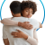 Male and female hugging with NeoGenomics circle behind them